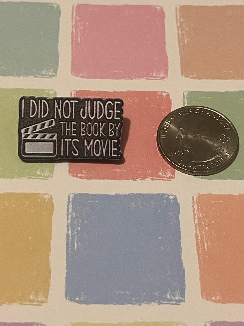 Acrylic pin “I Did Not Judge the Book by its Movie” Black White